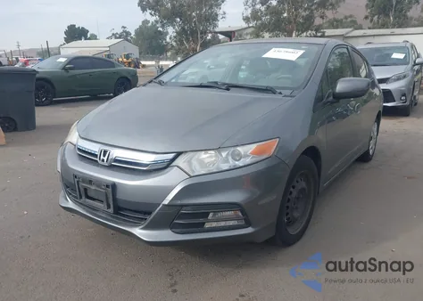 2012 Honda Insight from USA, damaged, VIN JHMZE2H38CS003495